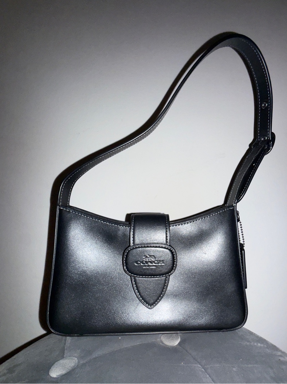 Coach “Eliza” Black Leather Shoulder Bag with Tab Closure